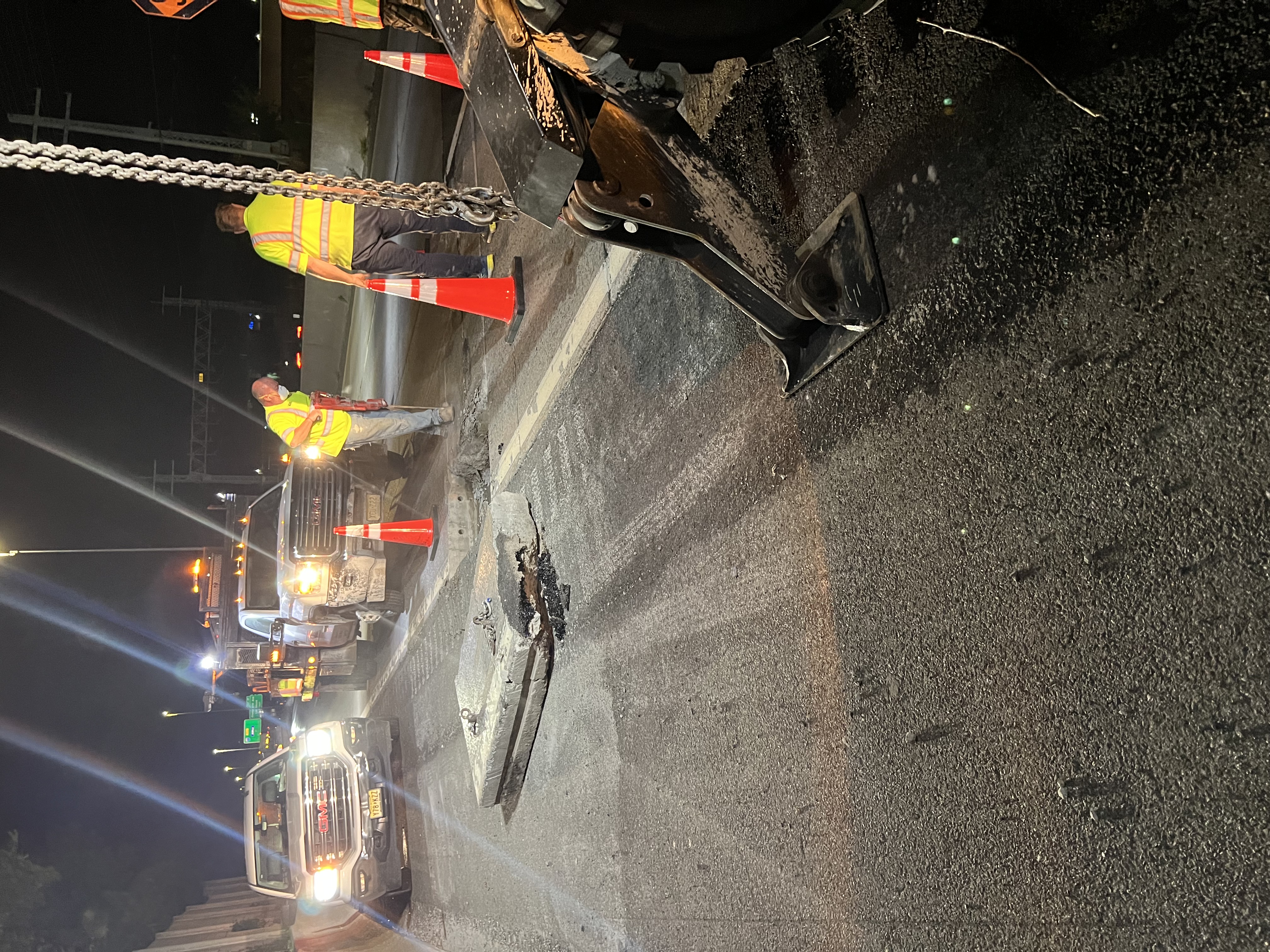 Heavy civil construction operations documented during nighttime field work