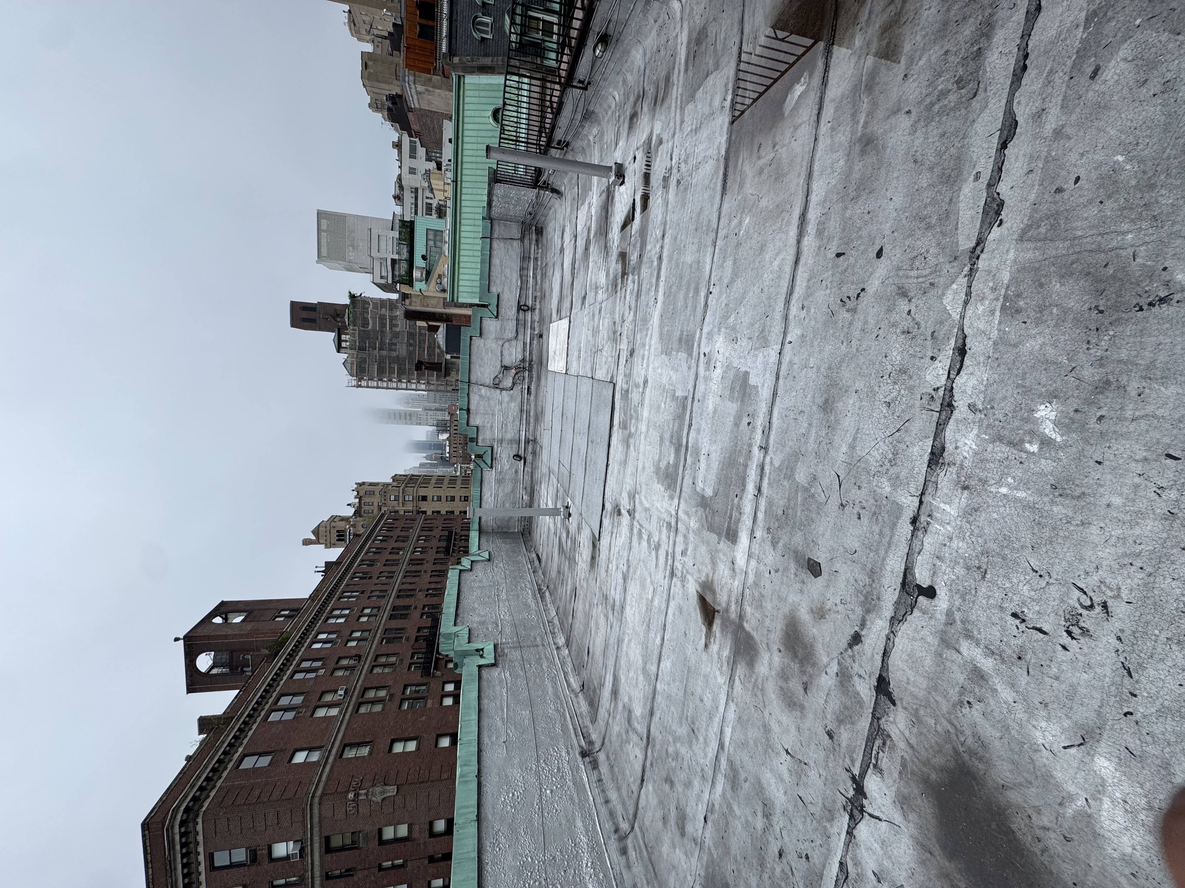 Parapet condition assessment documented for exterior construction review